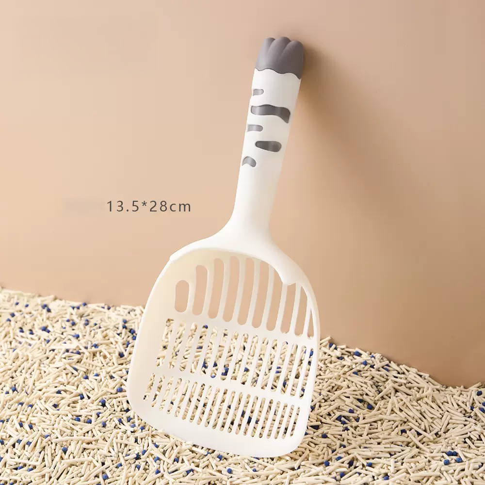Minimalist white cat litter shovel with a grey non-slip paw grip. The large 8mm top holes allow clean litter to pass through instantly, making daily cleaning effortless