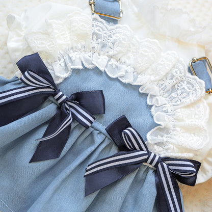 Macro shot of the navy and white striped satin bows and delicate lace ruffles. The sensory-soft fabric ensures comfort for pets while providing a chic maritime vibe