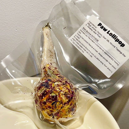 Single Paw Lollipop with an edible whiting fish stick and goat milk pop.