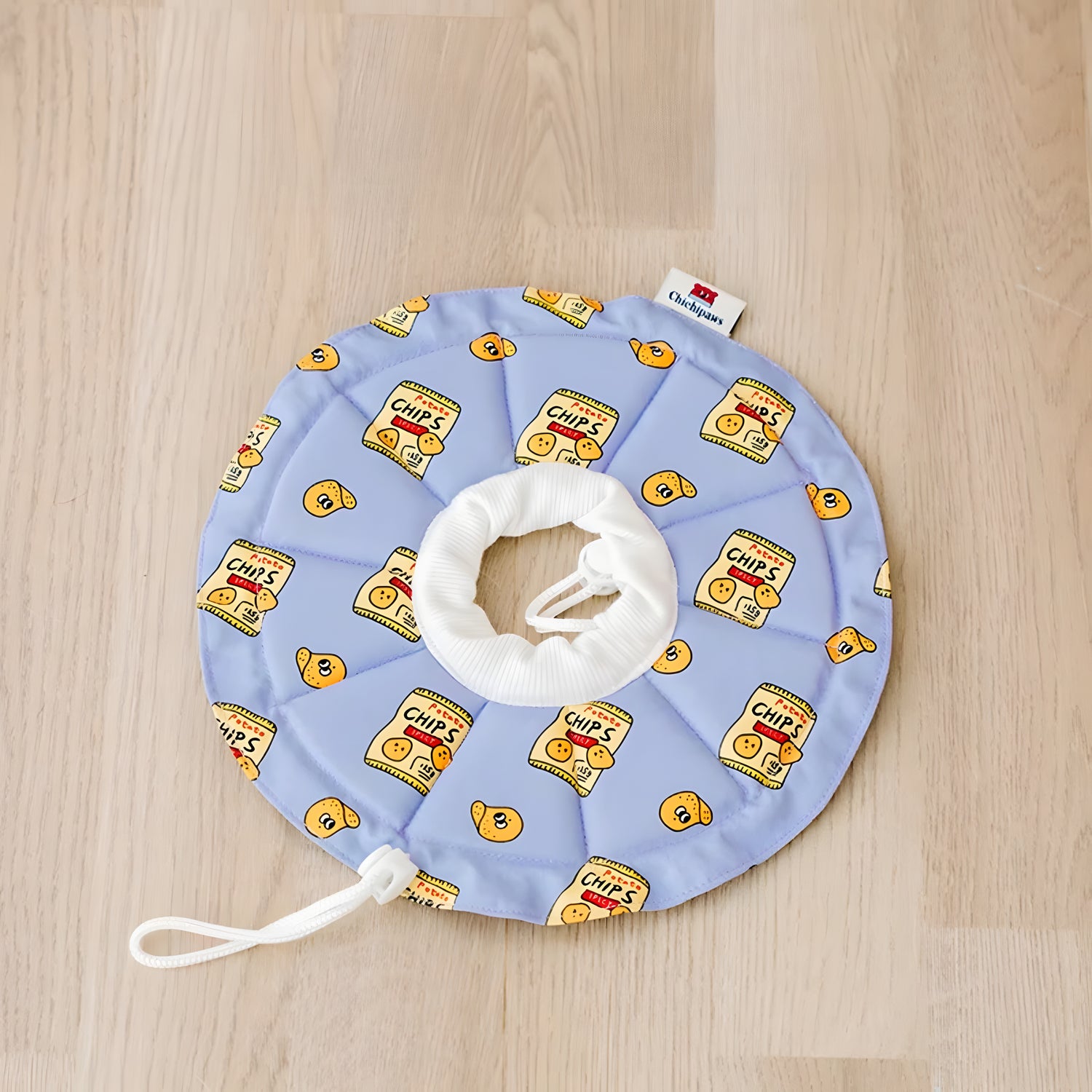 Soft Recovery Collar in Potato Chips print. A lightweight, sensory-friendly alternative to hard cones that blocks peripheral vision
