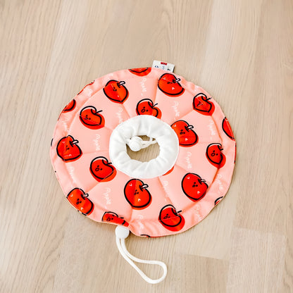 Red Apple print recovery collar. Functions as a soft pillow for napping while preventing pets from licking stitches