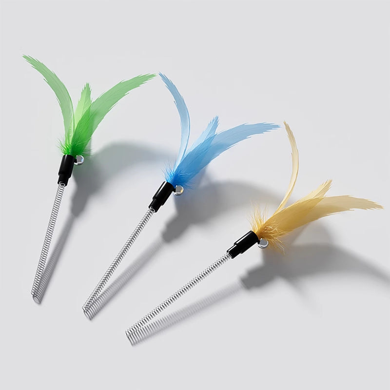 Close-up of the detachable spring-loaded feather wands for the Boredom Buster toy. Can be used as a handheld teaser for bonding playtime.