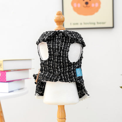 Interior view of the sleeveless tweed dog vest dress on a mannequin. The structured fabric acts like a weighted blanket to keep pets calm and warm