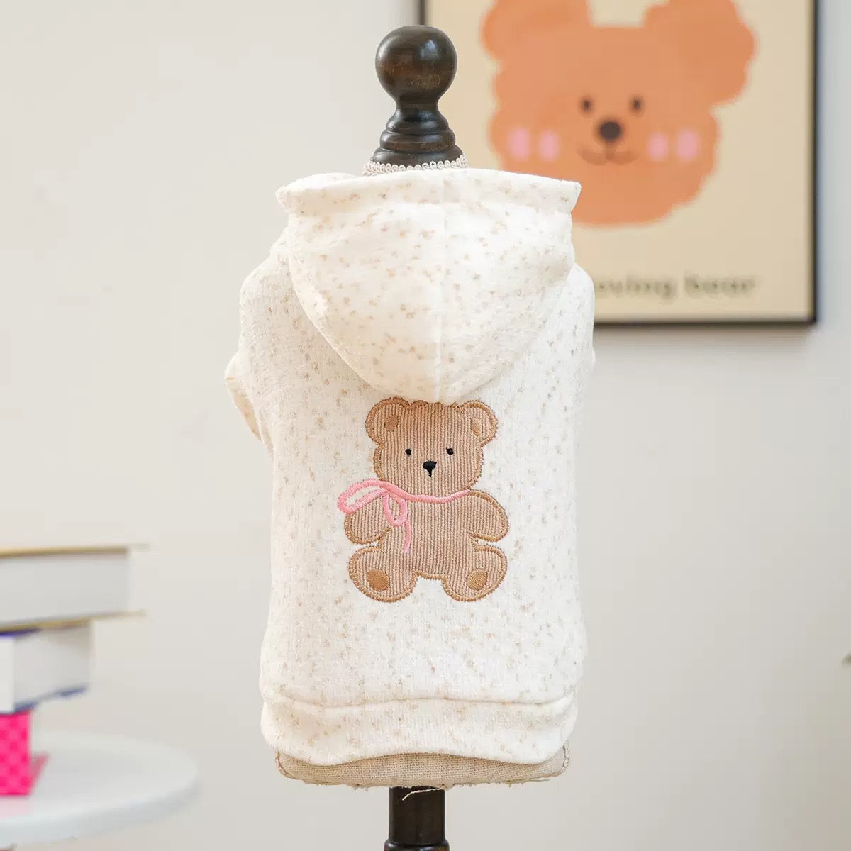 Back view of the dog sweatshirt on a mannequin. Offers the warmth of a favorite blanket with a sweet, nostalgic touch that sparks joy