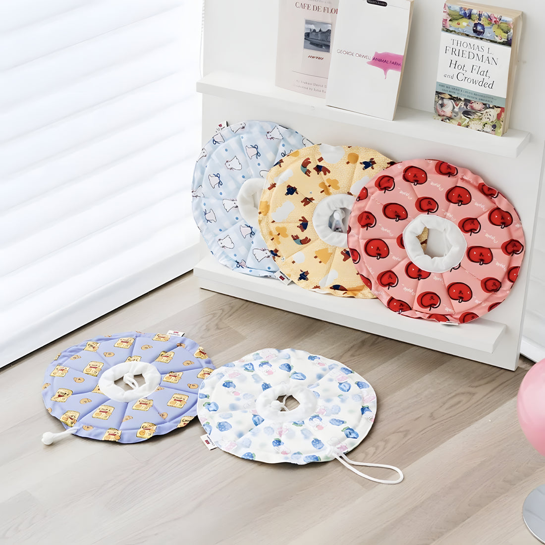 Collection of Soft Elizabeth Collars in cute prints (Chips, Apple, Bear, Rabbit). A water-resistant, pillow-like alternative to the plastic cone of shame
