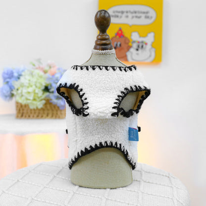 Back view of the Sherpa vest on a mannequin. The premium bouclé fabric mimics a warm hug, making it the perfect statement piece for cold weather fashionistas