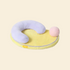 The Mango Pet Bed featuring a purple U-shaped security pillow, yellow base, and a detachable pink play ball, crafted from ultra-soft faux rabbit fleece.
