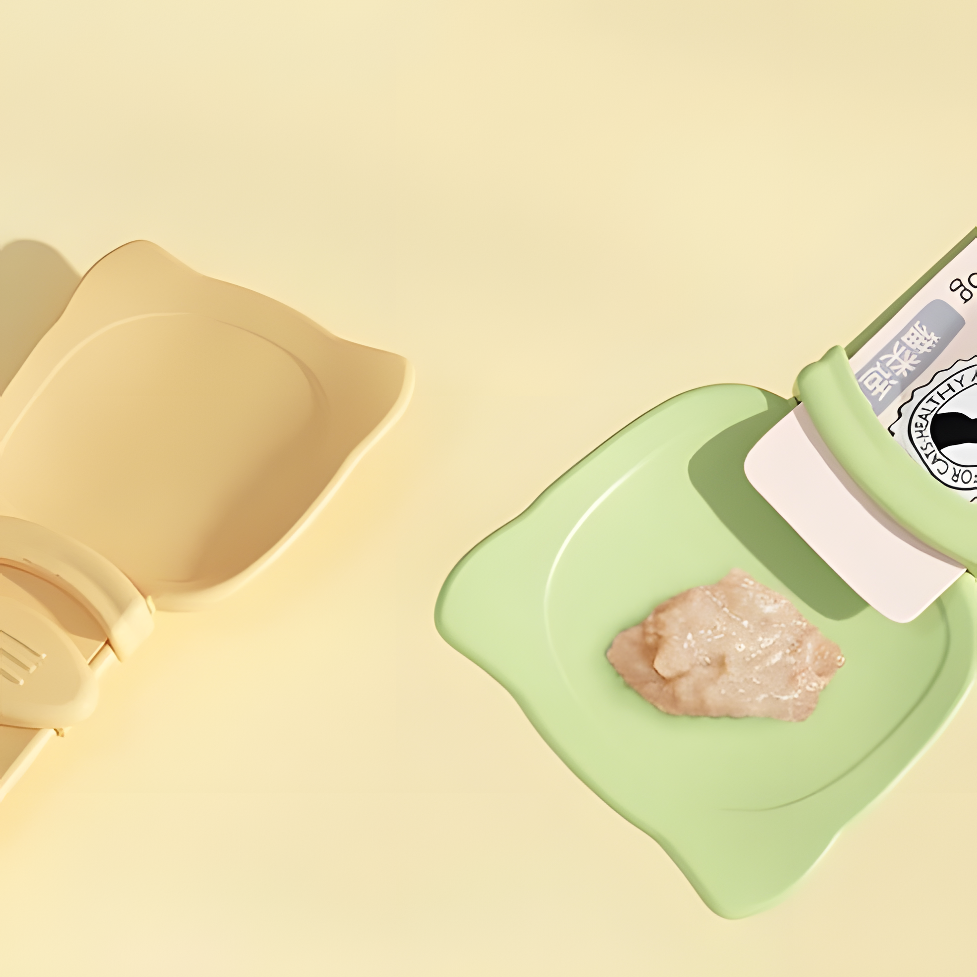 Top-down view of the cat liquid treat spoon bowl with puree neatly dispensed onto the green surface, ensuring a mess-free and hygienic feeding experience.