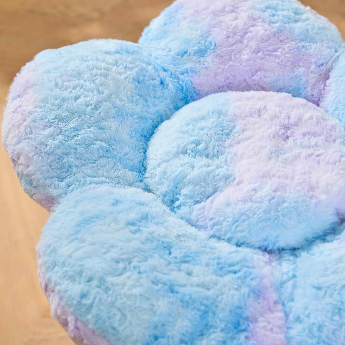 Close-up of the blue purple and pink plush flower perch in the Aurora colour