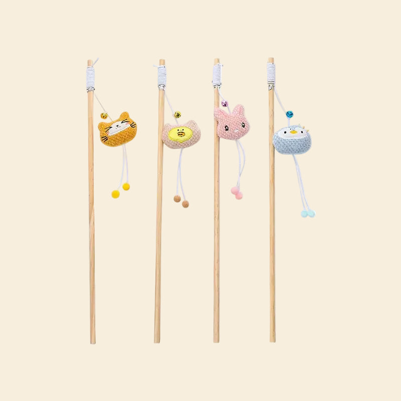 A collection of four LéJoyee natural wood cat teaser wands lined up vertically against a white background, displaying the ultra-soft fleece options: orange cat, beige chick, pink bunny, and blue penguin.