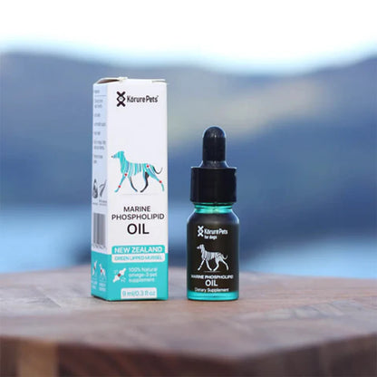 Kōrure Pets Marine Phospholipid Oil 9ml bottle and box sitting on a wooden surface with a beautiful New Zealand lake and mountain background.