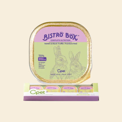 A top-down view of a single OPET Bistro Box Rabbit &amp; Black Truffle tray placed above its purple multipack retail display box, showing how the individual peel-and-serve trays are packaged.
