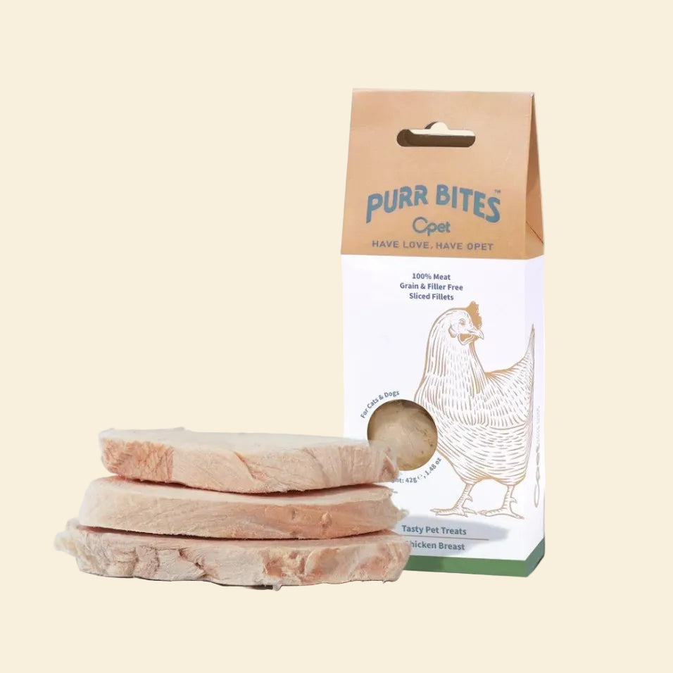 OPET Purr Bites freeze-dried chicken breast treats for dogs and cats in a 42g box with sliced fillet pieces