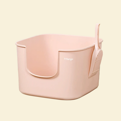 Mango Cube open cat litter box in pastel pink, featuring the included free extra-large matching litter scoop hanging conveniently on the high side wall.