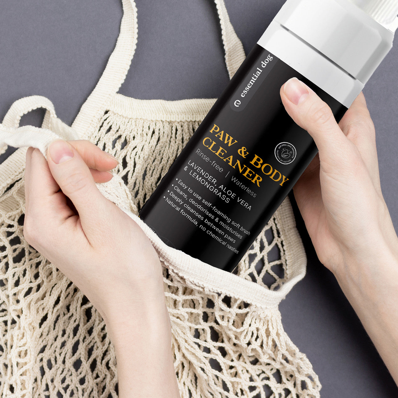 Packing the Essential Dog Paw Cleaner into a travel bag. The ultimate &