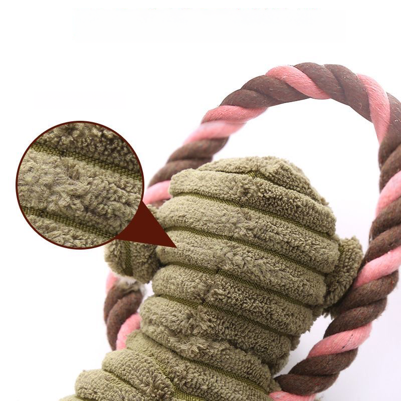 Close-up of the Corduroy Animal Plush Toy, featuring a magnifying glass graphic highlighting the premium, bumpy corduroy texture that is gentle on a dog&