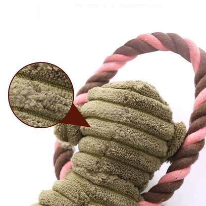 Close-up of the Corduroy Animal Plush Toy, featuring a magnifying glass graphic highlighting the premium, bumpy corduroy texture that is gentle on a dog&