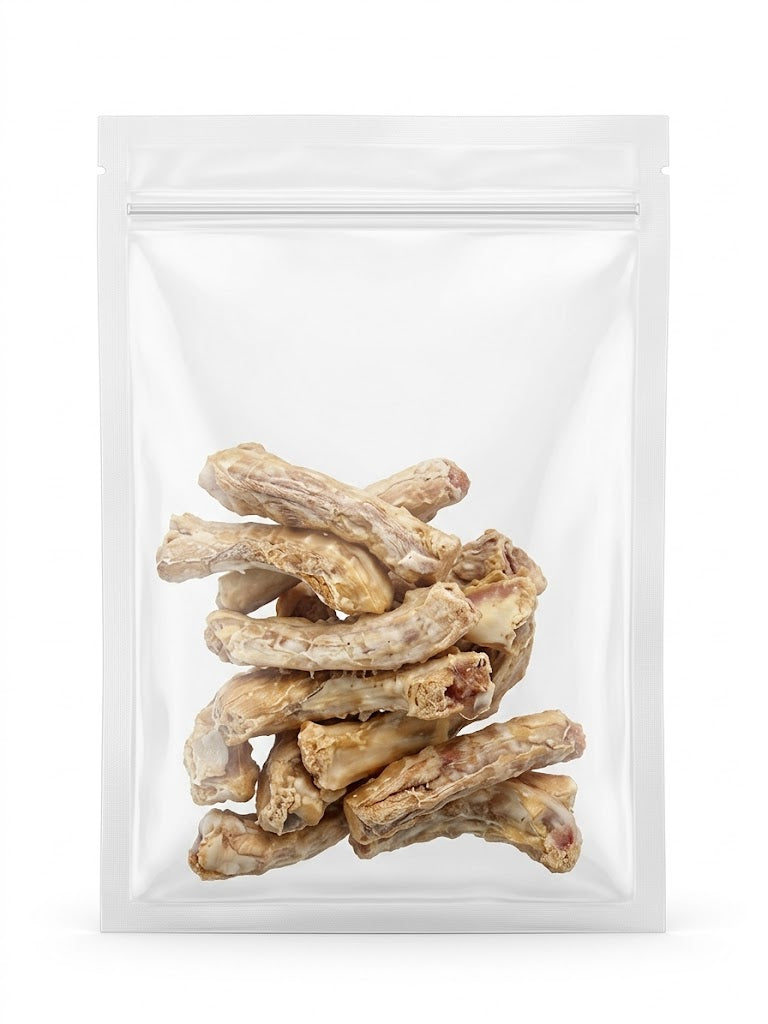 A clean studio shot of a clear stand-up pouch filled with natural freeze-dried chicken necks, perfect for supporting joint mobility and oral health in pets.