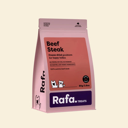 Front packaging of the RAFA freeze-dried beef steak pet treats in a bold pink pouch, featuring "Human Grade", "100% yummo beef steak", and "No fridge, no fuss, no worries".