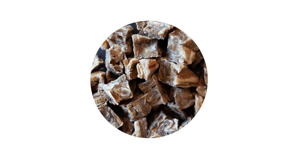 Close-up circular view of 100% pure air-dried ovine tripe for dogs, highlighting its natural, nutrient-rich texture designed to support gut health and a strong immune system.