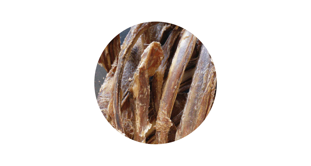 Close-up circular view of the 100% pure air-dried veal ribs for dogs, highlighting the natural meat on the bone texture designed for joint support.