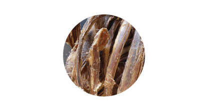 Close-up circular view of the 100% pure air-dried veal ribs for dogs, highlighting the natural meat on the bone texture designed for joint support.