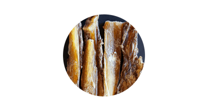 Close-up circular view of 100% pure air-dried venison paddywack for dogs, highlighting its naturally tough, fibrous texture that is rich in glucosamine and chondroitin for healthy teeth and joints.