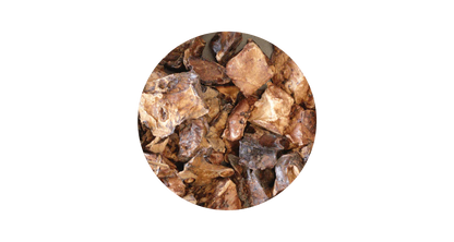 Close-up circular view of 100% pure air-dried lamb lung puffs, showcasing the soft and airy texture that is easy to chew for puppies with developing teeth and senior dogs.
