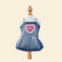 The Honey Heart Denim Dog Dress displayed on a pet mannequin, highlighting the expert tailoring of the ruffled skirt and perfectly faded vintage wash.