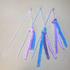 cat teaser wands featuring plush bunny heads with long fleece tails and bells.