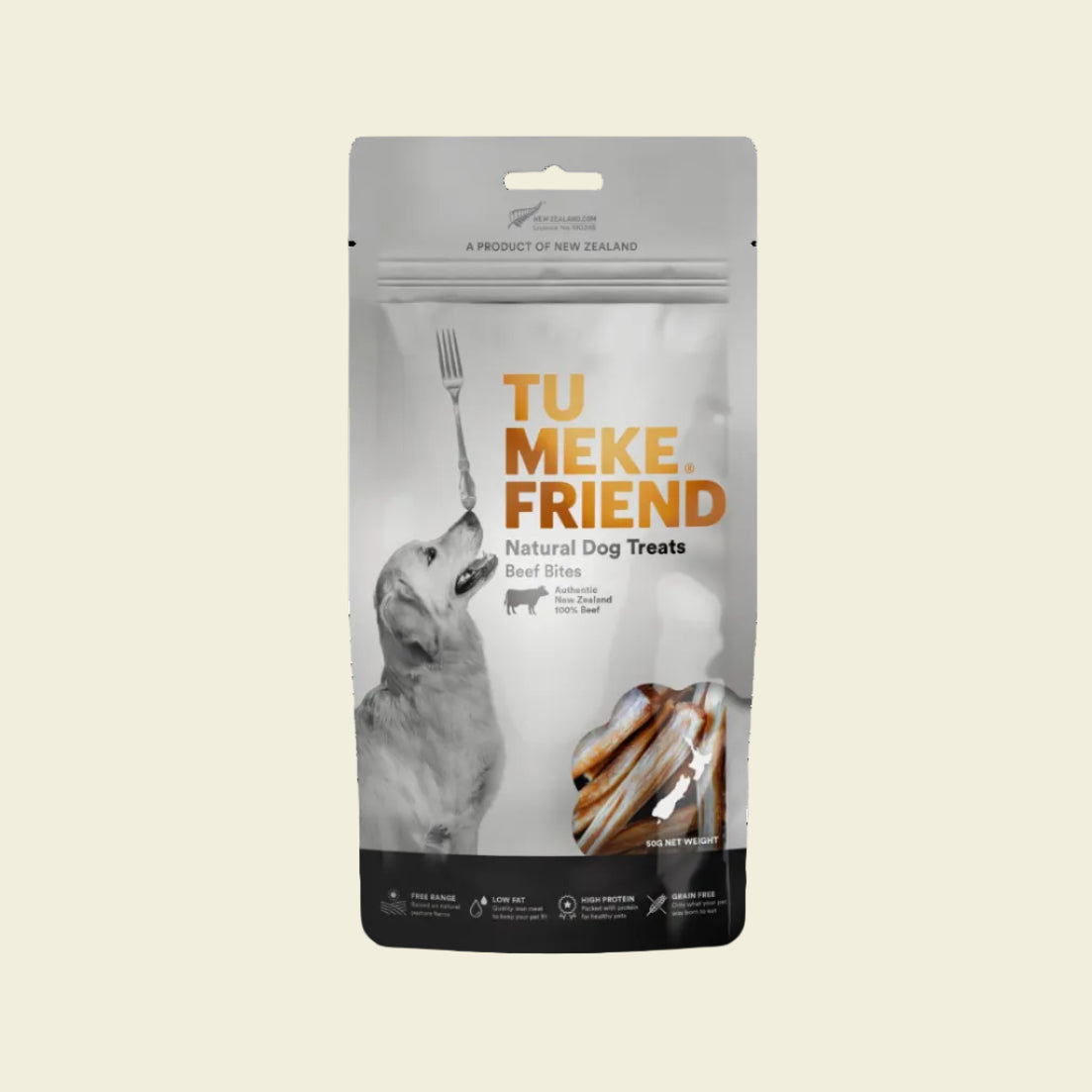Front packaging of TU MEKE FRIEND Air-Dried Beef Bites (50g), featuring a Golden Retriever balancing a fork on its nose and a clear window displaying the natural braided beef treats.