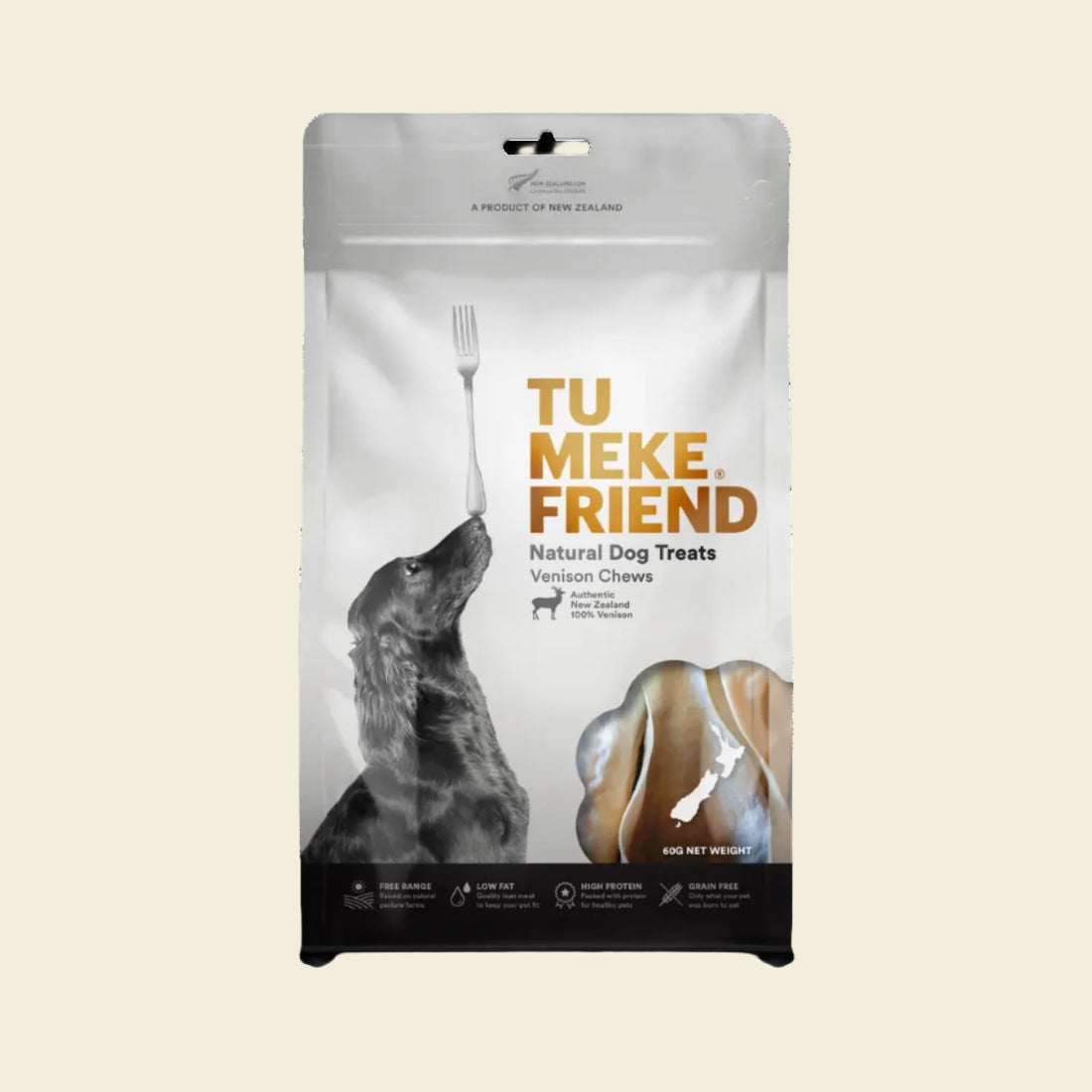 Front packaging of TU MEKE FRIEND Air-Dried Venison Chews (60g), featuring a bull terrier dog balancing a fork and a clear window displaying the natural hypoallergenic deer ear treats.
