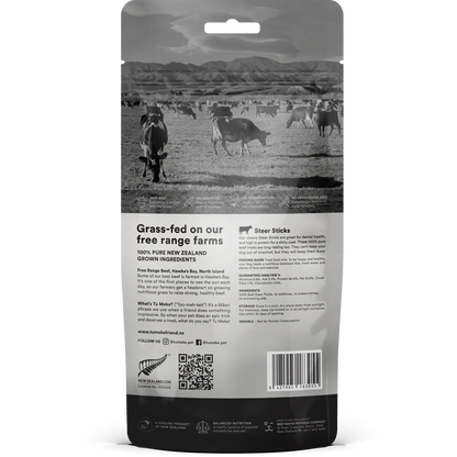 Back of the TU MEKE FRIEND Steer Sticks pouch, detailing the 80.4% protein content, free-range New Zealand beef sourcing, and single-ingredient purity.