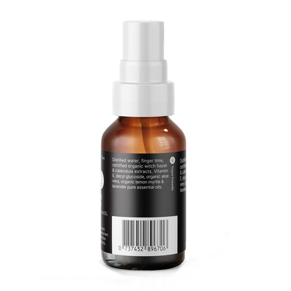 Back view of the Essential Dog ear cleaner bottle, showing the barcode, Vegan Friendly logo, and a list of certified organic ingredients including witch hazel, calendula extract, and aloe vera.