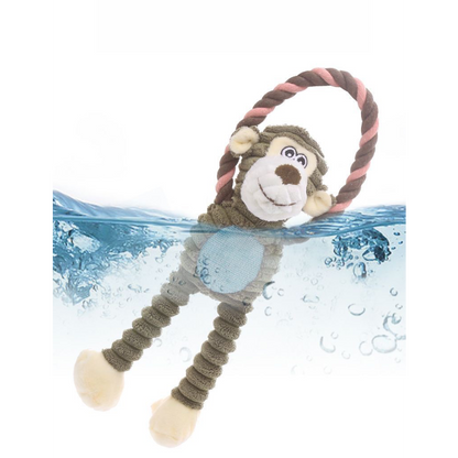 The Cheeky Monkey corduroy dog toy partially submerged in water, demonstrating that it is fully washable, hygienic, and colorfast after heavy play.
