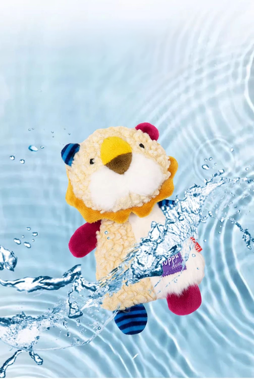 The plush lion dog toy displayed with dynamic water splash graphics and ripples, demonstrating that the calming security blanket toy is fully washable and easy to clean.