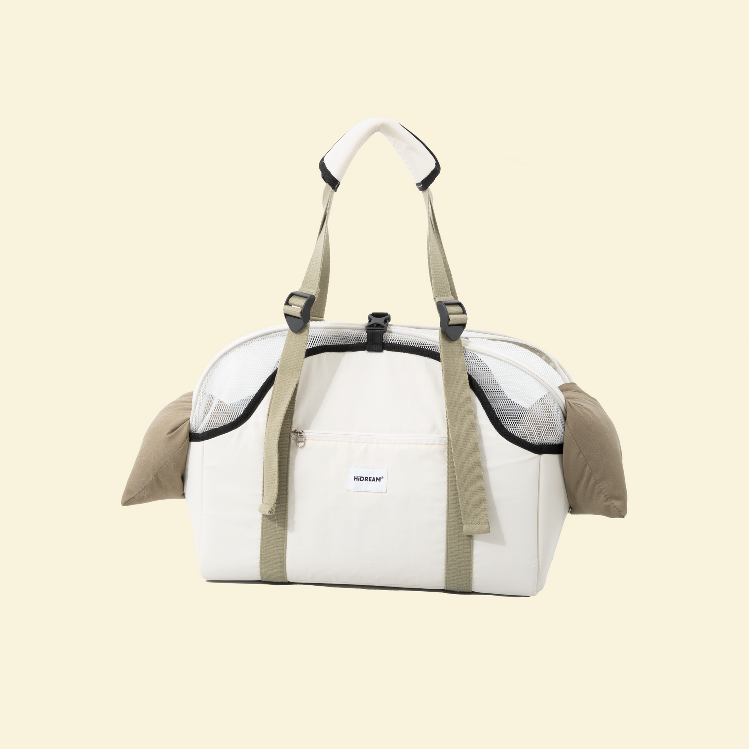 Full studio view of the white and olive green pet carrier tote, highlighting the anti-sag solid base and comfortable side resting pillows for cats and small dogs.