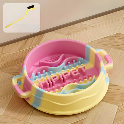 A clean studio shot of the Wiz Pink pastel swirl silicone slow feeder bowl, showcasing the double side handles and intricate 3-in-1 anti-gulp feeding zones.