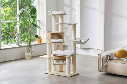 Wide interior view of the modern wooden cat tree placed near a window in a spacious living room.