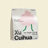 Front packaging of the 2.5kg Xu Cuihua Mixed Cat Litter, featuring a minimalist pink graphic and text highlighting its low tracking, non-stick corn and bentonite blend.