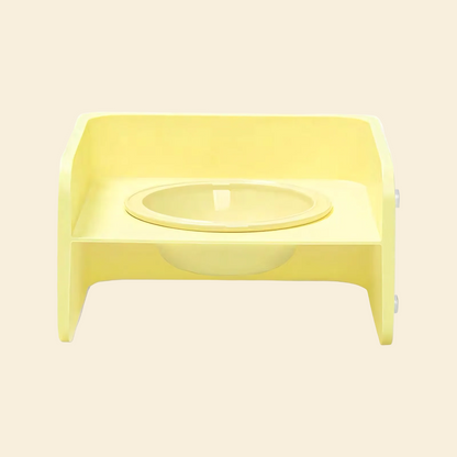 Clean front view of the yellow Mango Square Table Ceramic Pet Bowl, showing the smooth, durable ABS plastic stand and the perfectly fitted curved ceramic bowl.