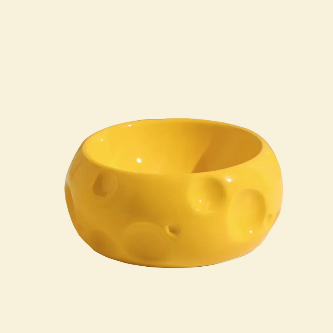 Yellow ceramic bowl on a white background