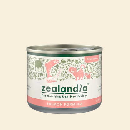 Front view of the ZEALANDIA Salmon Mousse Pâté Kitten &amp; Mama wet cat food can, featuring elegant botanical illustrations and a salmon pink formula band.