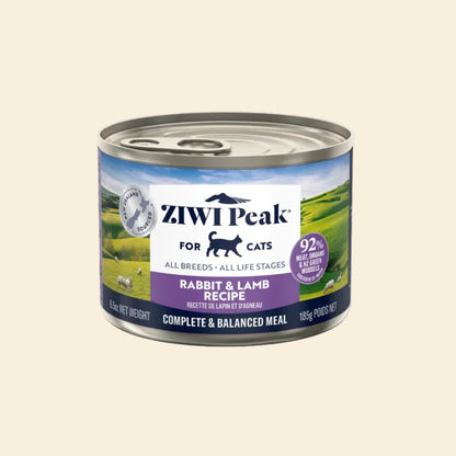 Front of the 185g ZIWI Peak Rabbit and Lamb Recipe can, featuring a lush New Zealand landscape. This protein-rich wet food is suitable for cats of all breeds and life stages.